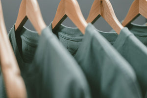 Row of polo shirts on hangers