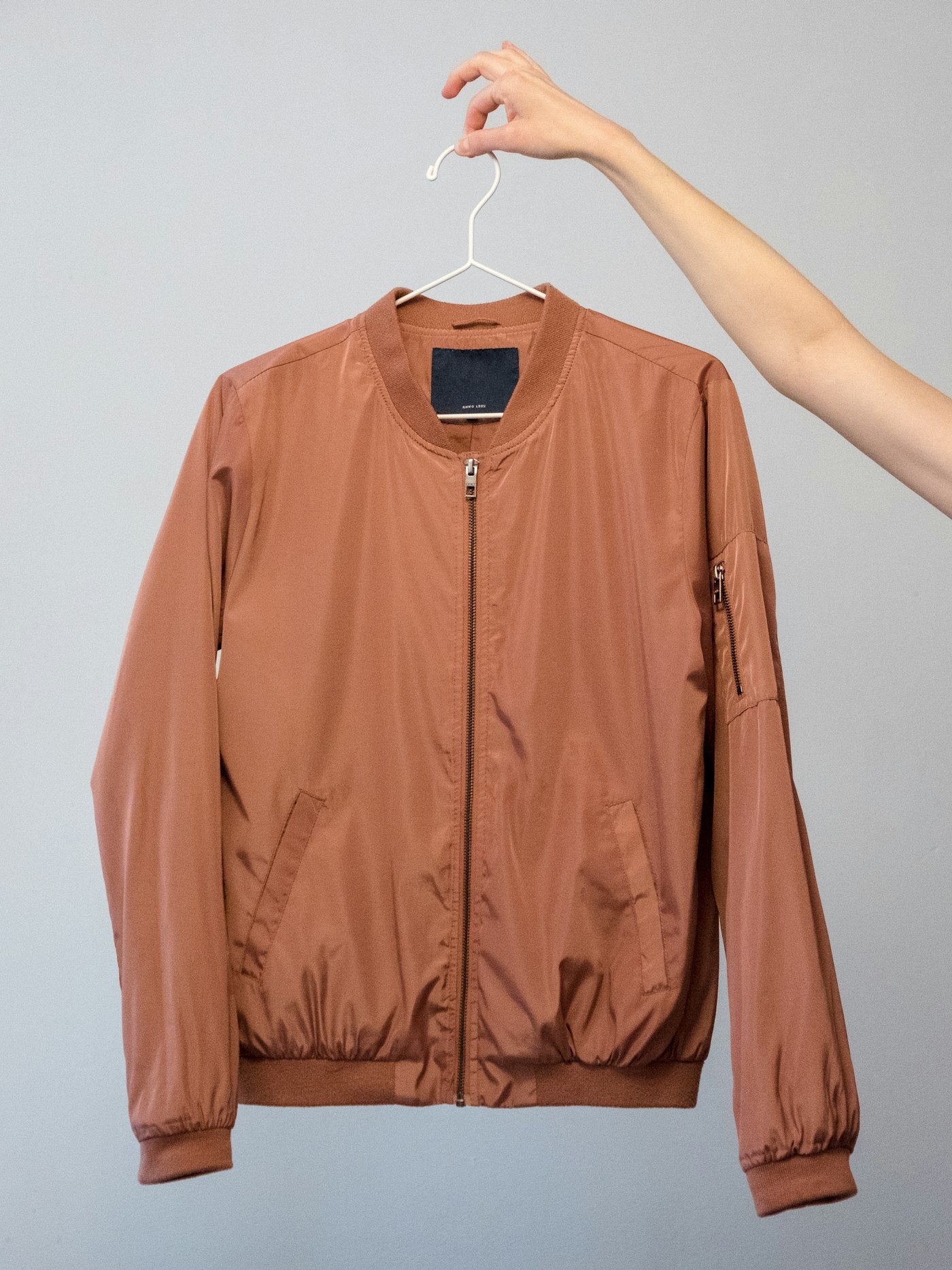 A lightweight jacket held up