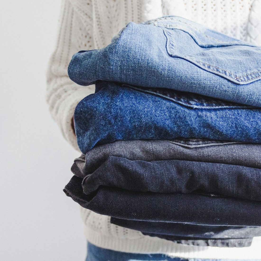 A stack of folded jeans