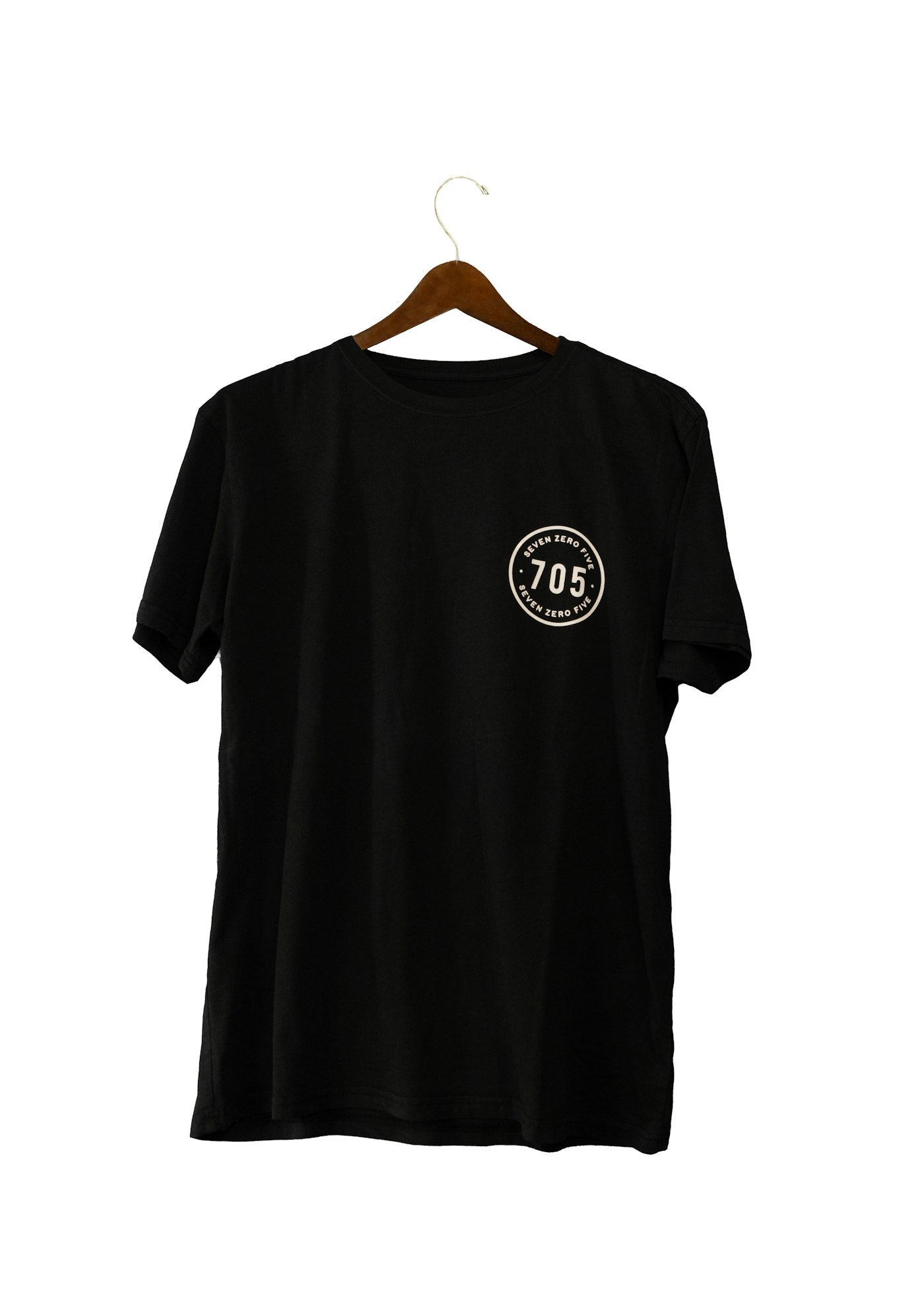 A plain black t-shirt on a hanger
