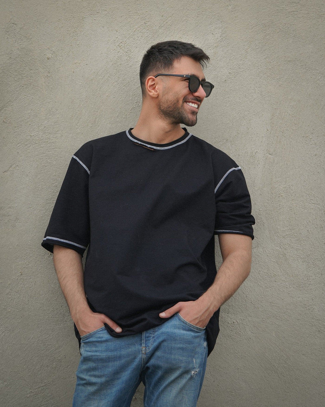 A man wearing a soft navy knit