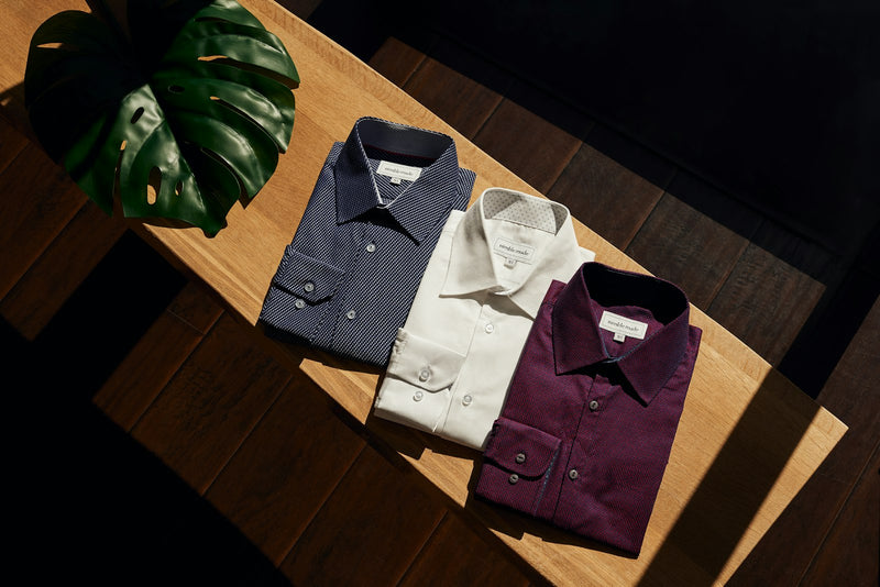 Folded flannel shirts on a table