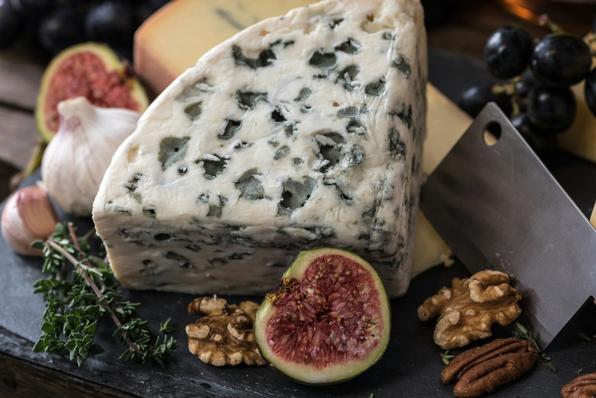 Blue cheese board with figs and walnuts