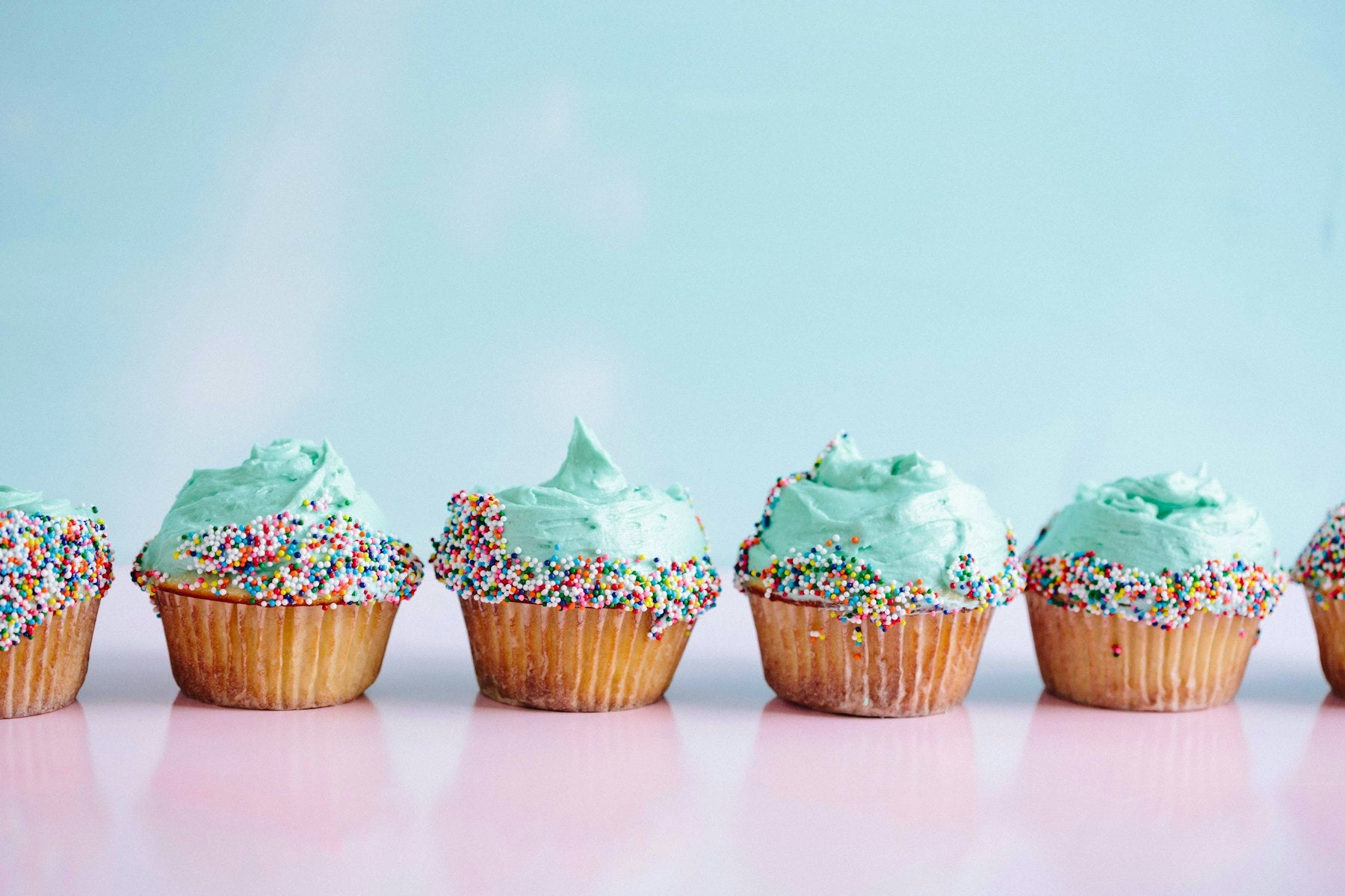 Iced cupcakes in a row