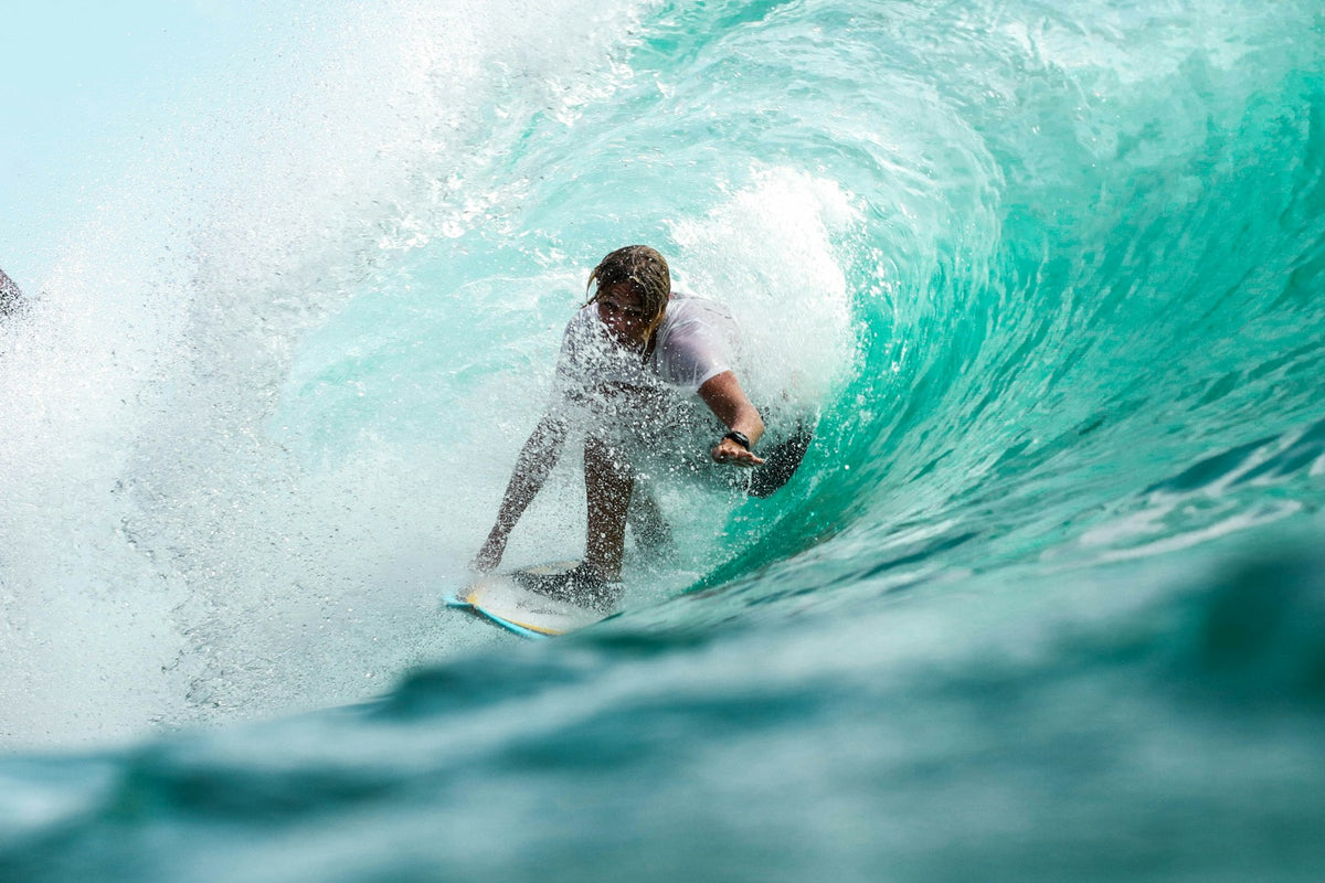 Surfer riding inside a wave