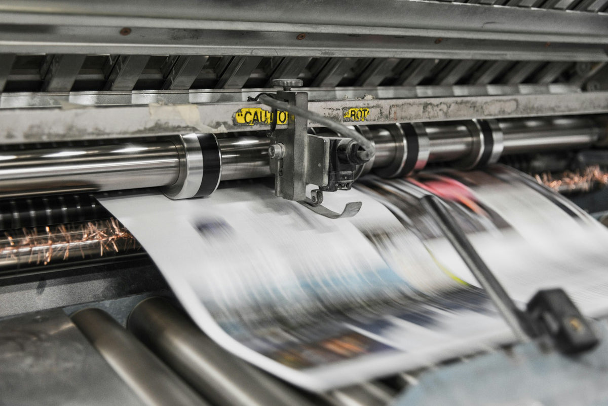 Sheets running through a printing press