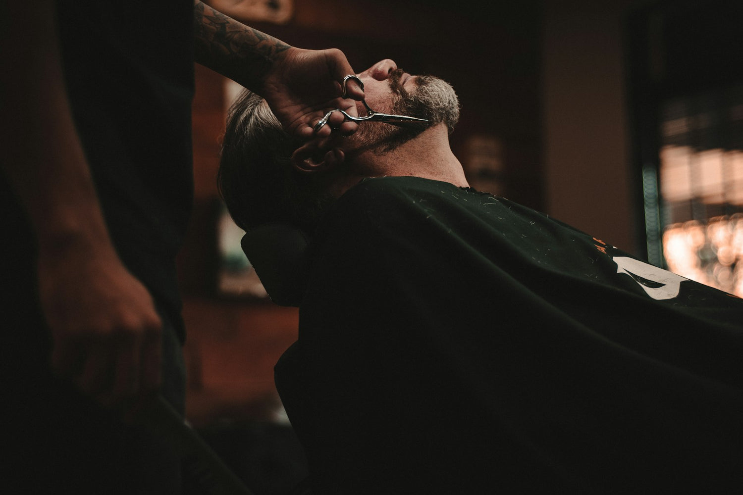 Barber giving a hot towel shave