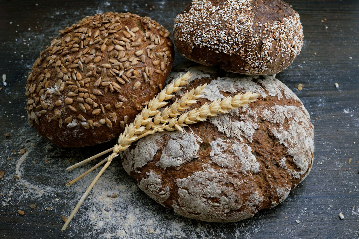 Sourdough loaves on a dark counter