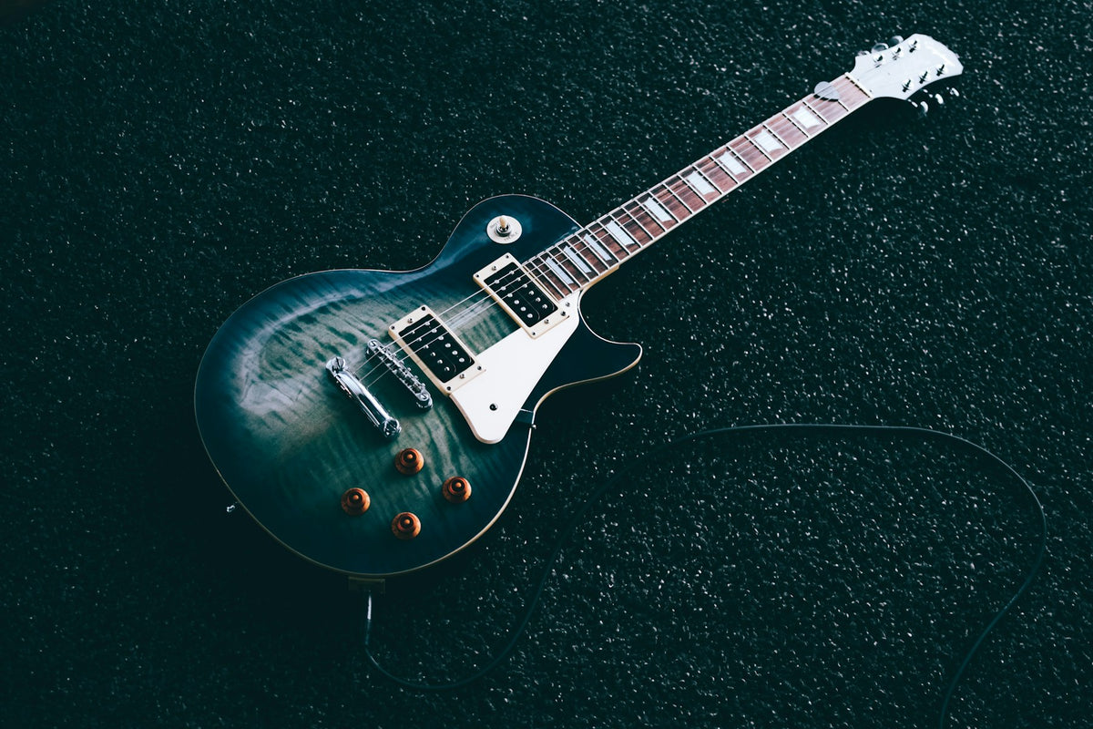 Electric guitar on a dark backdrop