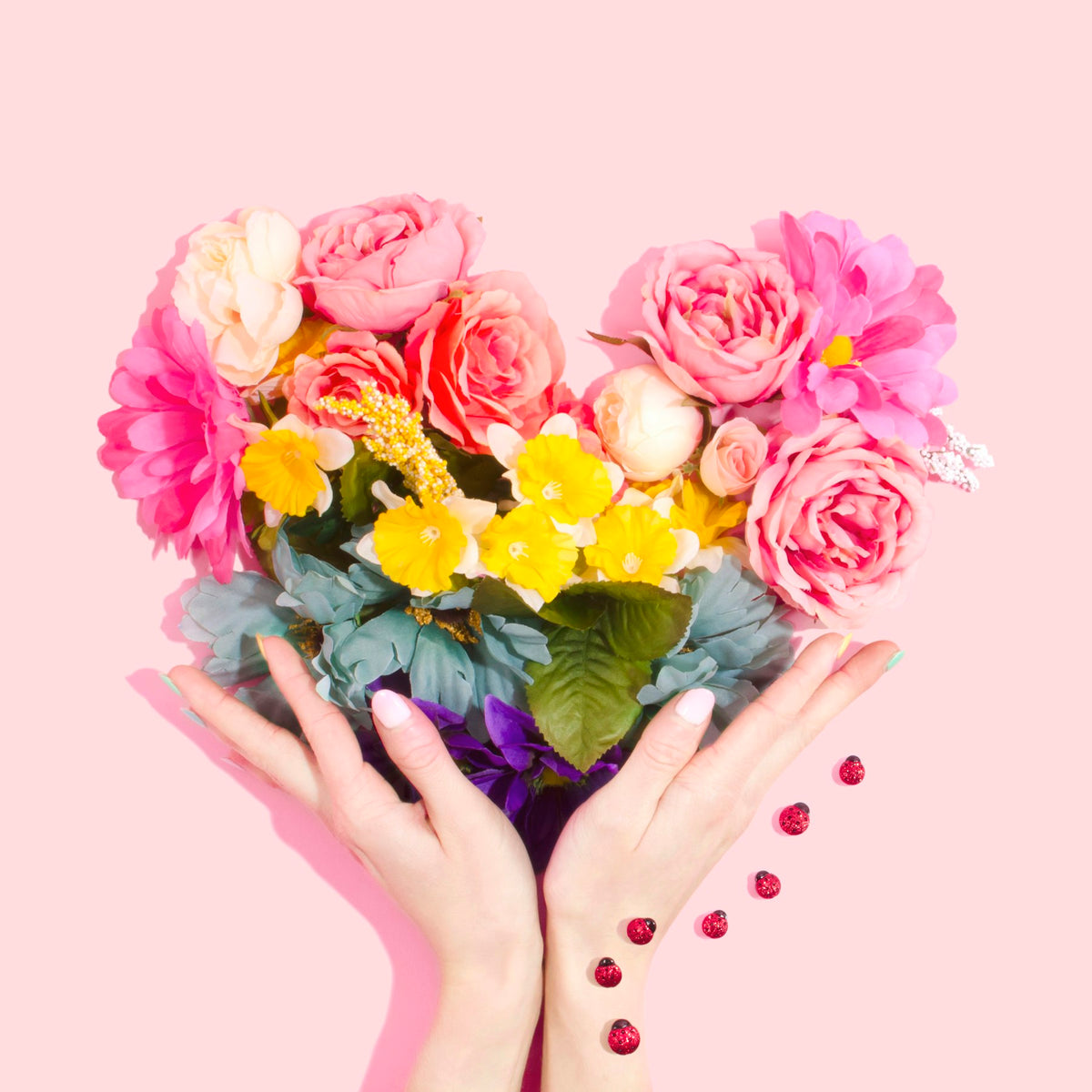Hands holding a bunch of flowers