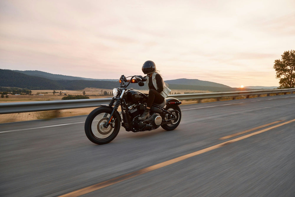 Rider on a motorcycle at dusk