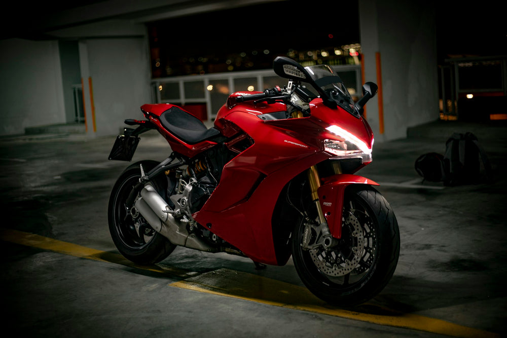 Red sports motorcycle in a garage