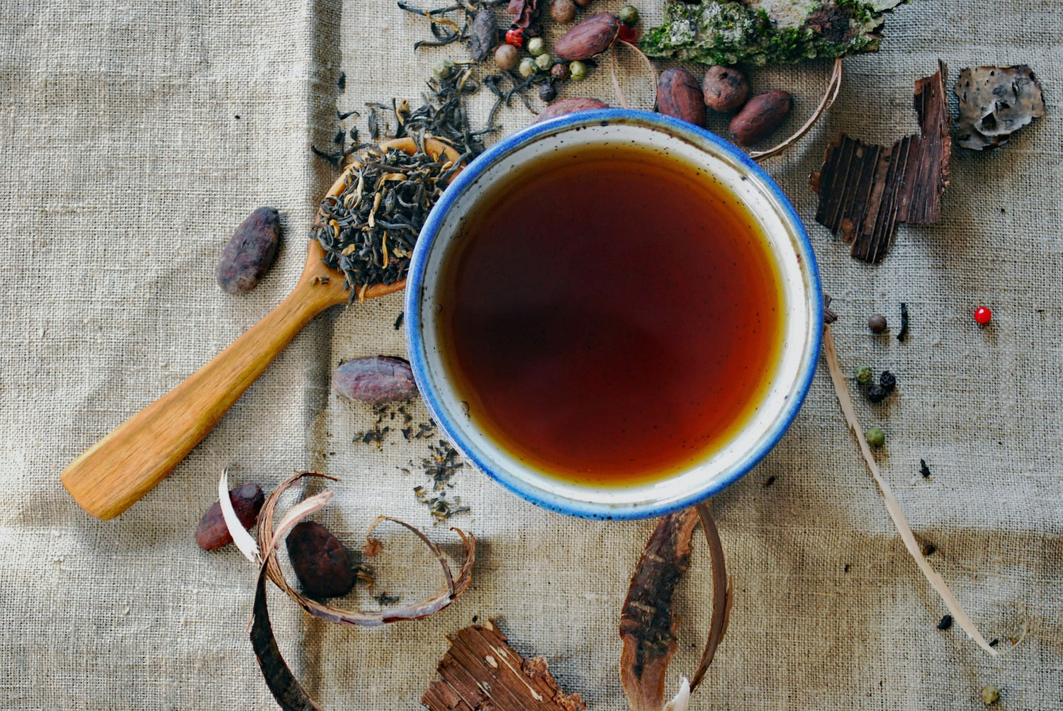 Bowl of tea with dried botanicals