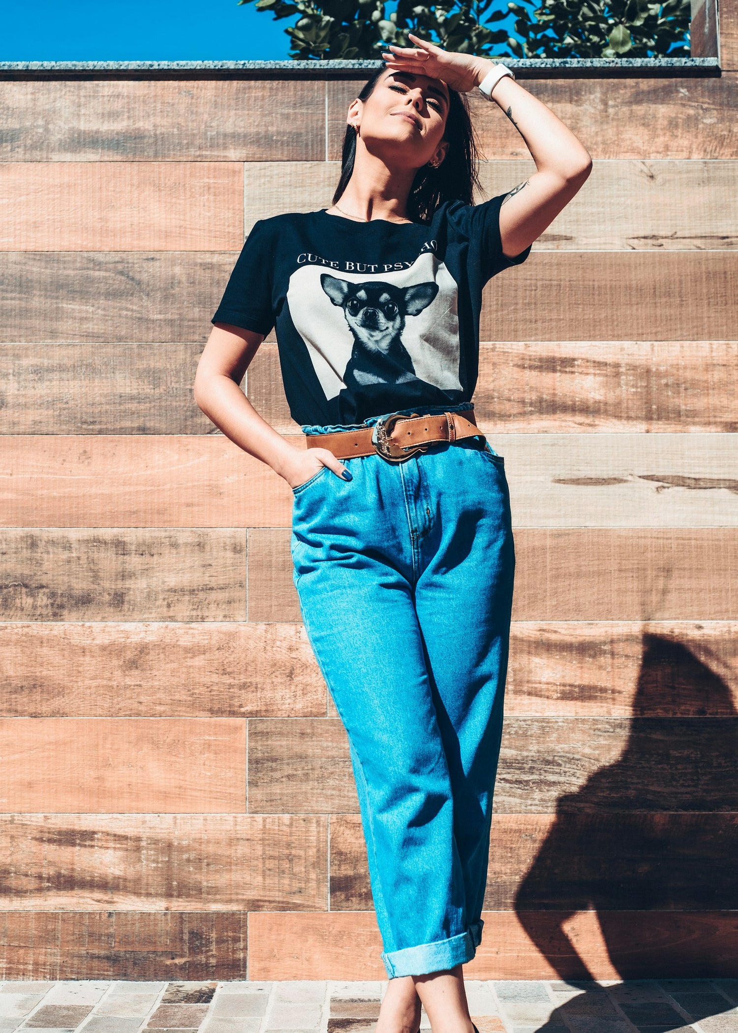Person wearing bright blue jeans