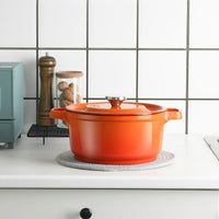 Orange enamel cast iron pot