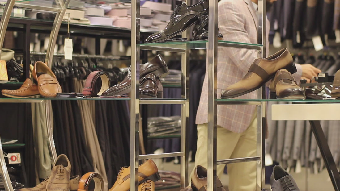 Shelves of leather shoes in a menswear shop