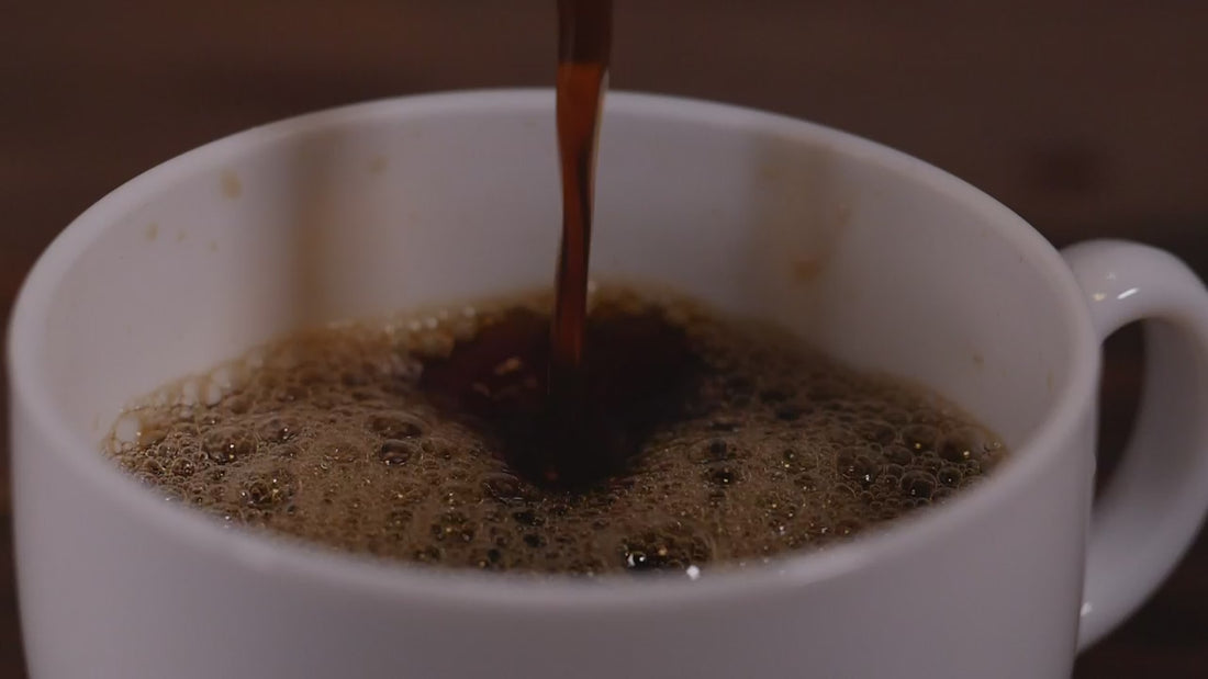 Filter coffee poured into a white cup