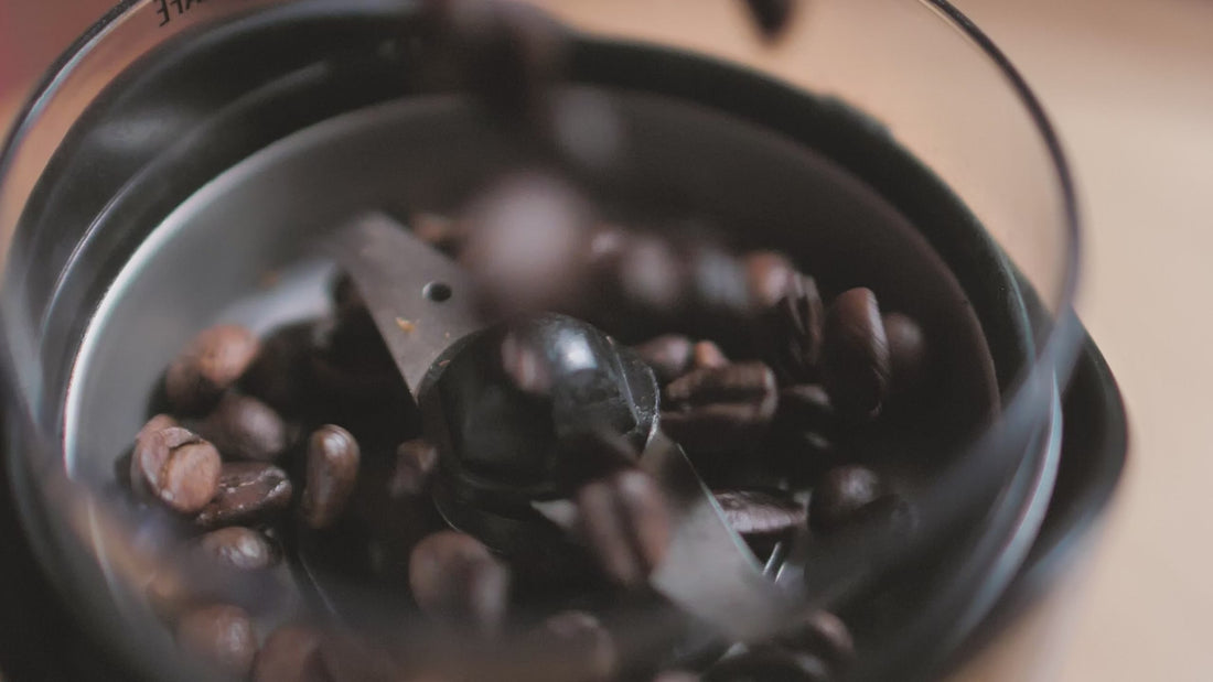 Beans turning in a coffee grinder